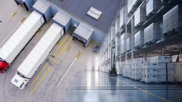 trucks unloading at warehouse for cross dock